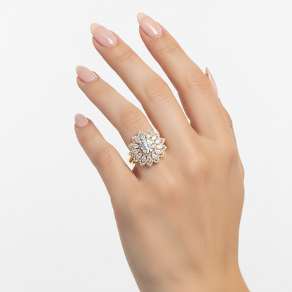 Female model wearing delicate yellow gold floral diamond cocktail ring
