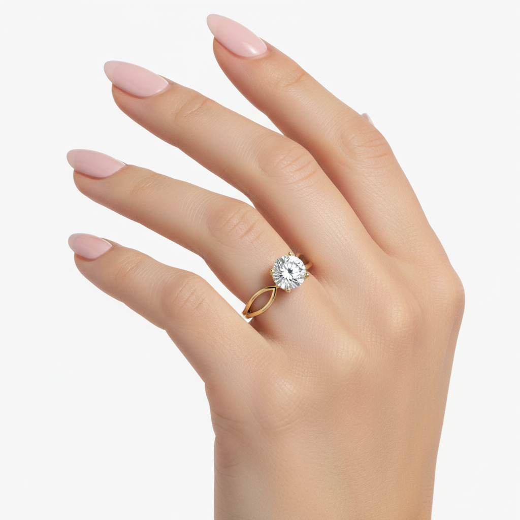 Female model wearing delicate yellow gold solitaire diamond ring