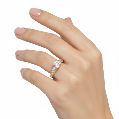 Female model wearing delicate yellow gold solitaire diamond ring