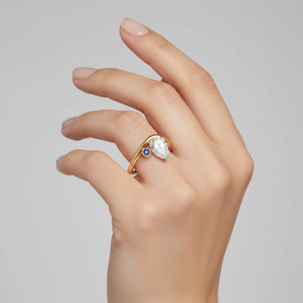Female model wearing diamond and sapphire wave ring