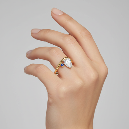 Female model wearing diamond and sapphire wave ring