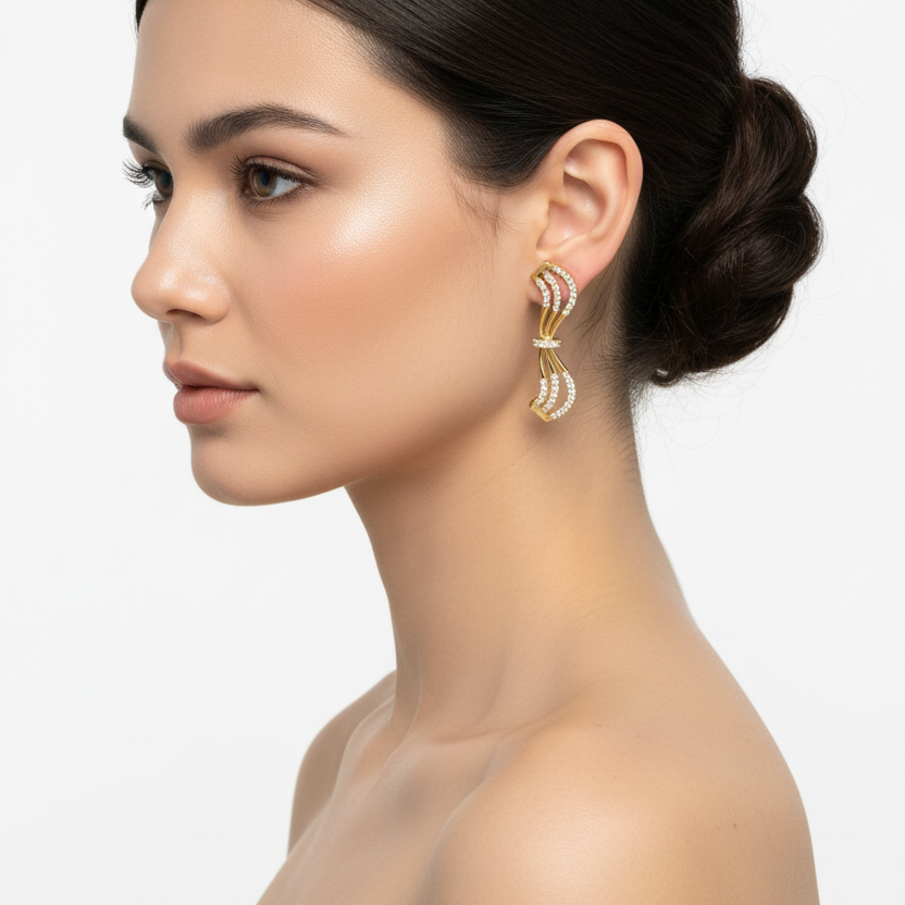 Female model wearing diamond bow earrings