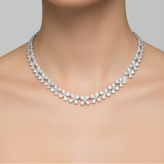 Female model wearing diamond floral necklace