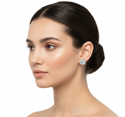 Woman wearing a diamond earring on a white background