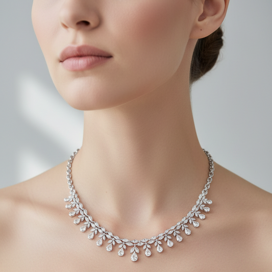 Female model wearing diamond leaf fringe necklace