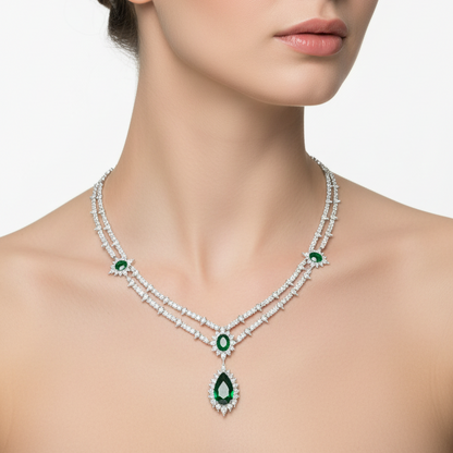 Female model wearing emerald and diamond multi-strand necklace