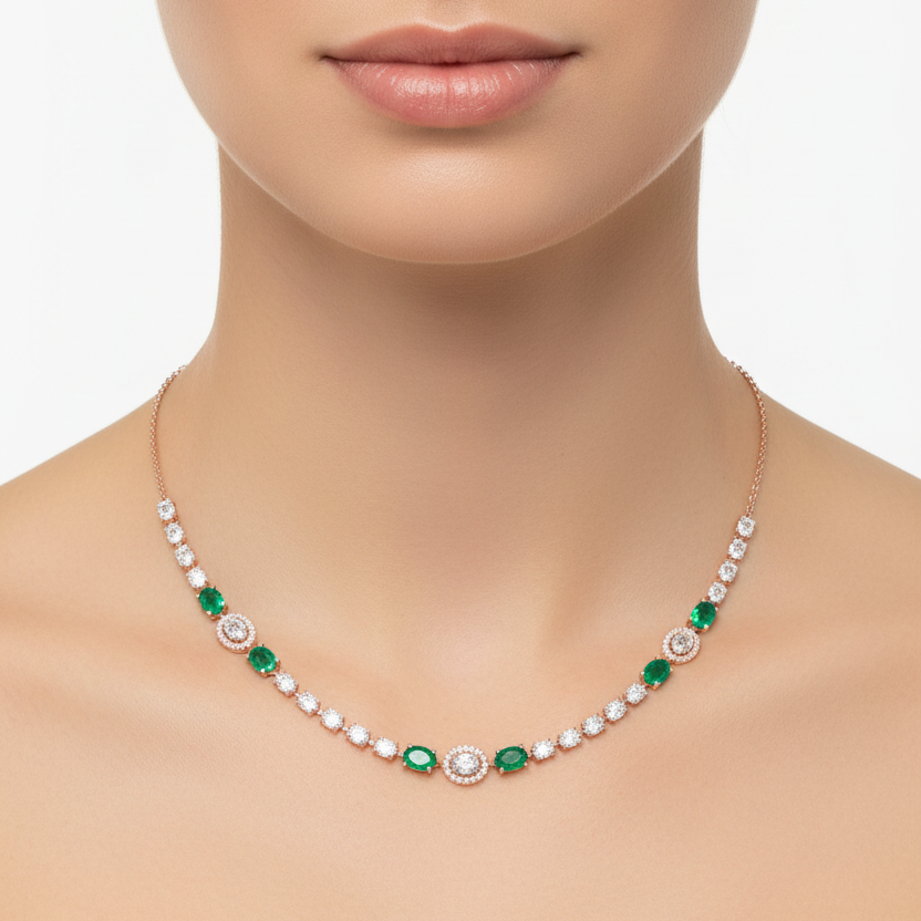 Female model wearing emerald and diamond necklace