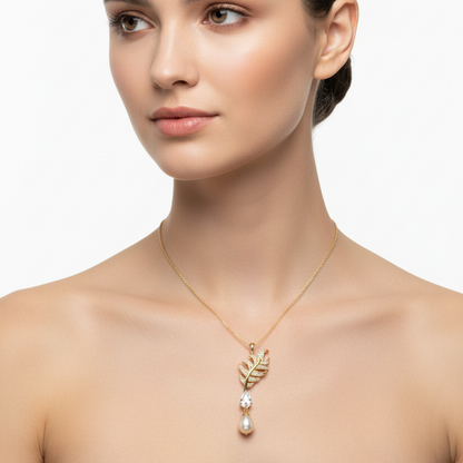 Female model wearing feather and pearl pendant