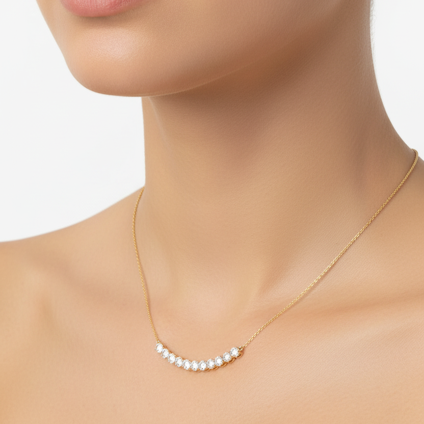 Female model wearing graduated diamond necklace