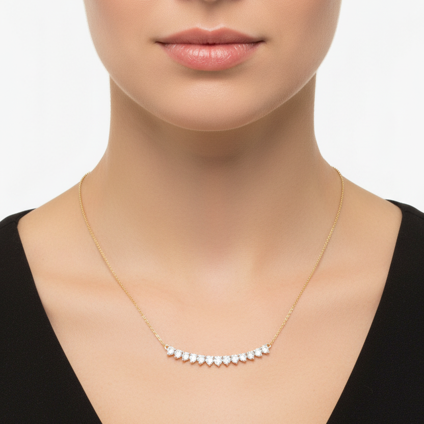 Female model wearing graduated diamond necklace