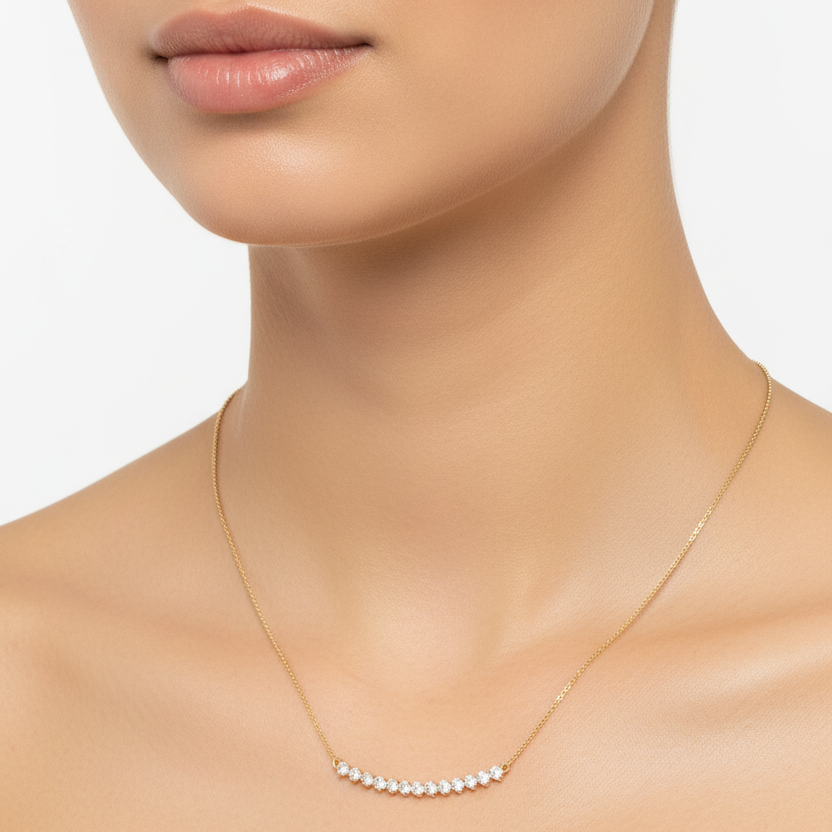 Female model wearing graduated diamond necklace