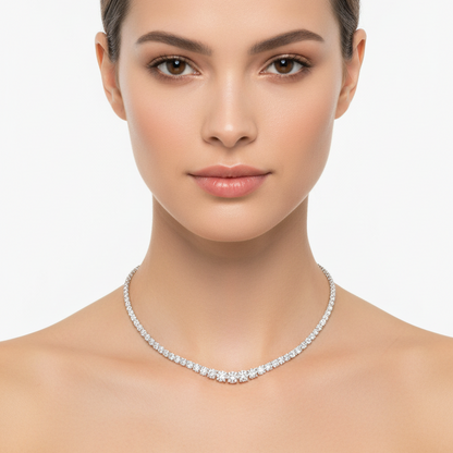Female model wearing graduated diamond rivière necklace
