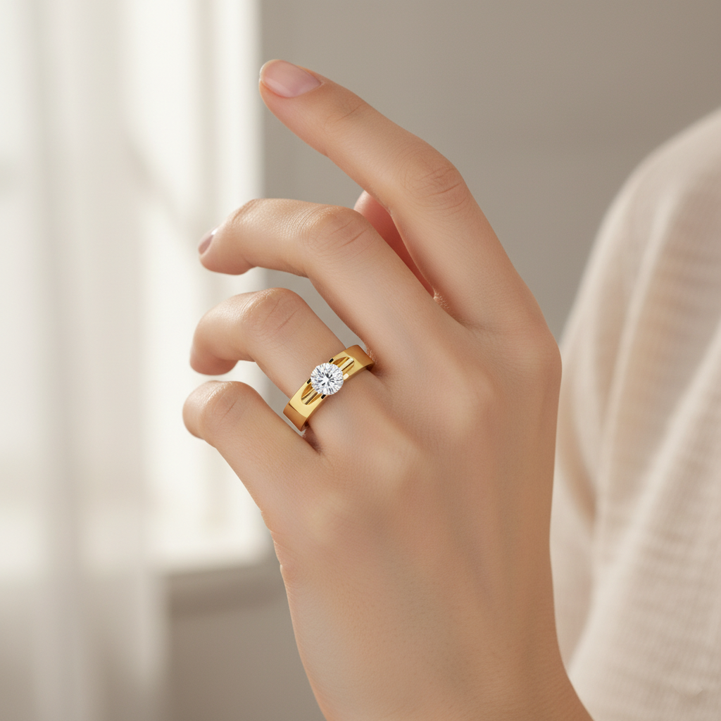 Female model wearing modern solitaire diamond ring