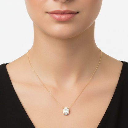 Female model wearing oval diamond halo pendant necklace