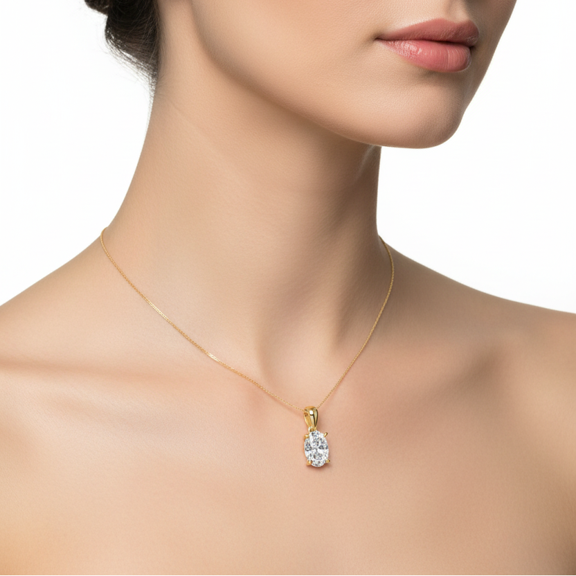 Female model wearing oval diamond pendant