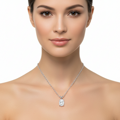 Female model wearing oval diamond pendant