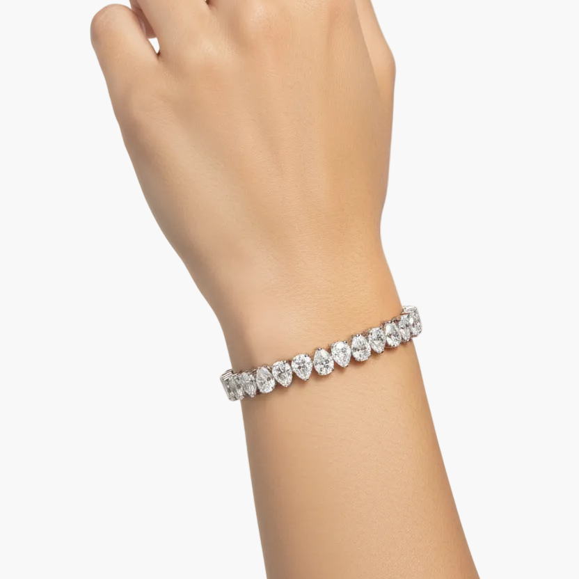 Female model wearing oval diamond tennis bracelet