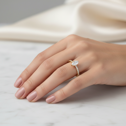 Female model wearing pear diamond ring