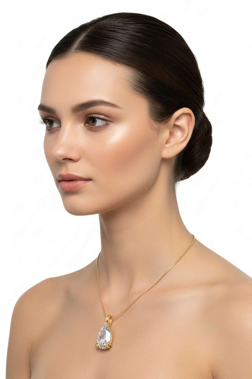 Female model wearing pear-shaped diamond pendant