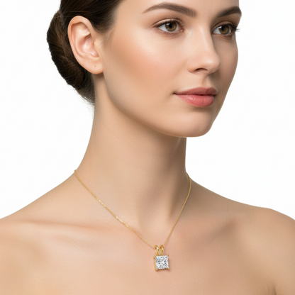 Female model wearing princess-cut diamond pendant