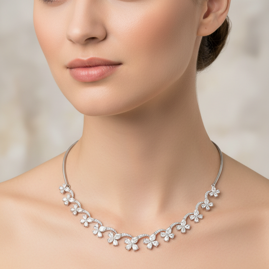 Female model wearing rose-cut floral vine necklace