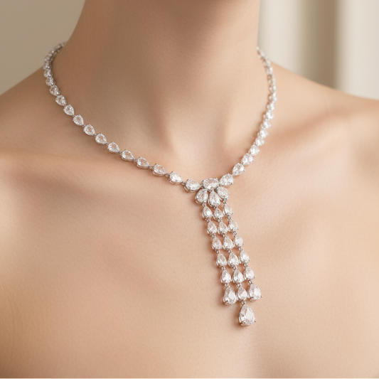 Female model wearing rose-cut pear diamond tassel collar necklace