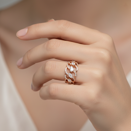 Female model wearing rose gold openwork diamond ring