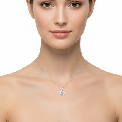 Female model wearing round diamond solitaire pendant