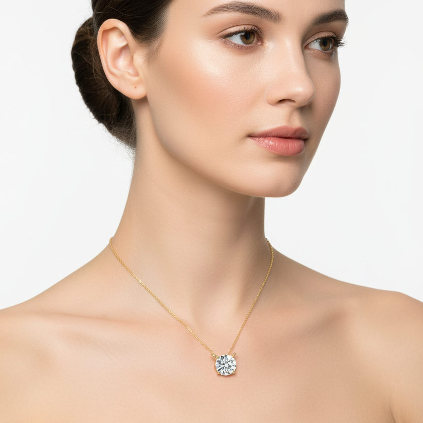 Female model wearing round diamond solitaire pendant