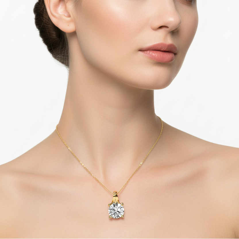 Female model wearing round diamond solitaire pendant