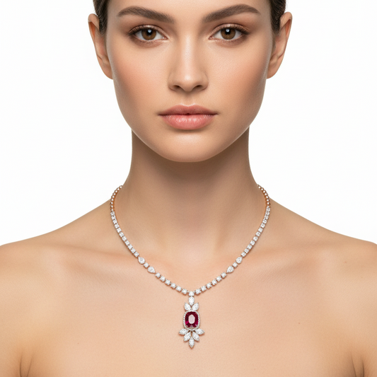 Female model wearing ruby and diamond necklace