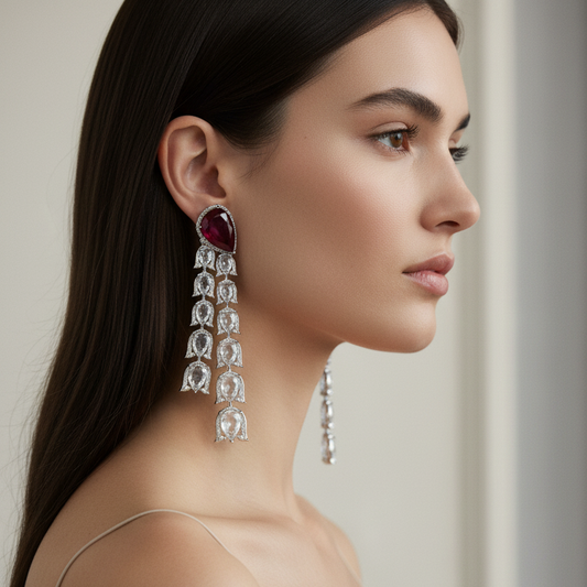 Female model wearing ruby rose-cut diamond tassel earrings