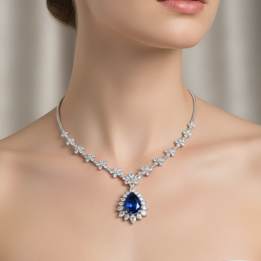 Female model wearing sapphire blossom garland necklace