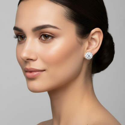 Female model wearing small halo diamond stud earrings