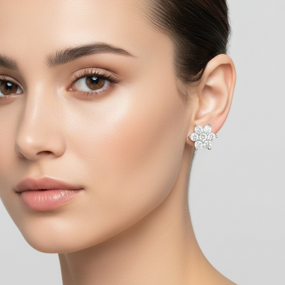 Female model wearing small white gold five-petal flower cluster diamond stud earrings