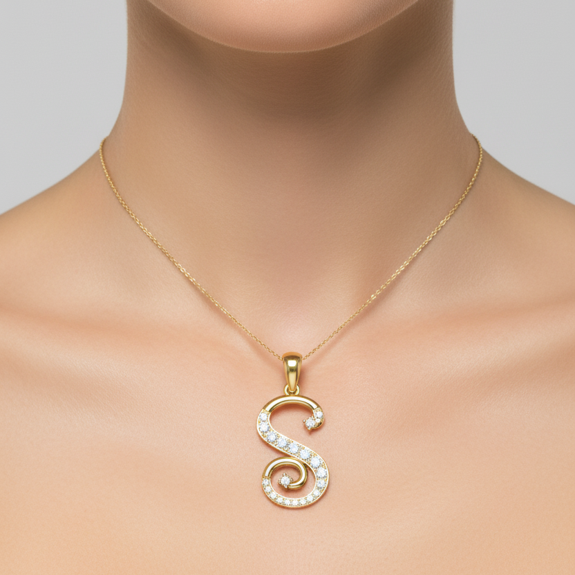 Female model wearing small yellow gold cursive letter S diamond pendant necklace