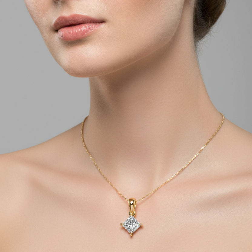 Female model wearing small yellow gold princess-cut diamond solitaire pendant necklace
