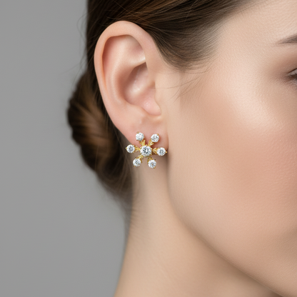 Female model wearing small yellow gold snowflake diamond flat-back labret stud as helix piercing
