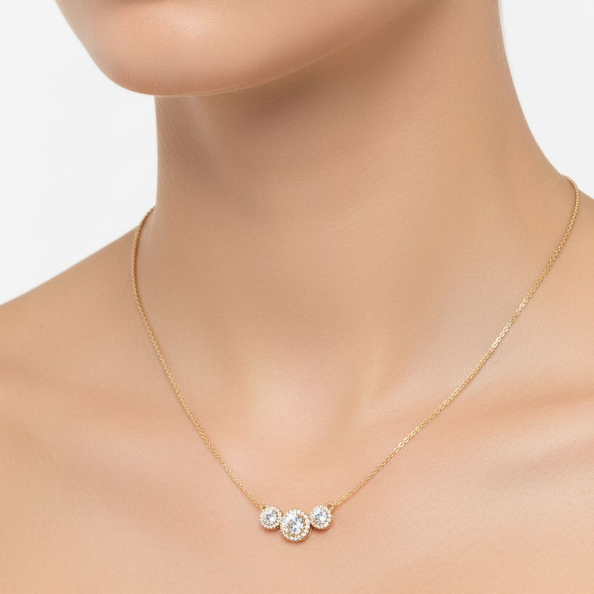 Female model wearing triple diamond halo pendant necklace