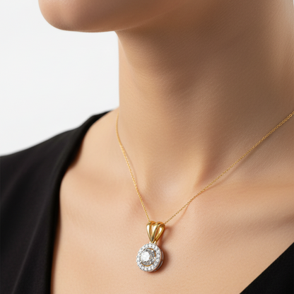 Female model wearing two-tone diamond halo pendant