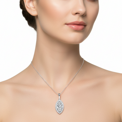 Female model wearing white gold marquise-cut diamond halo pendant