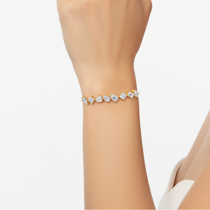 Female model wearing yellow gold adjustable mixed-cut diamond bracelet