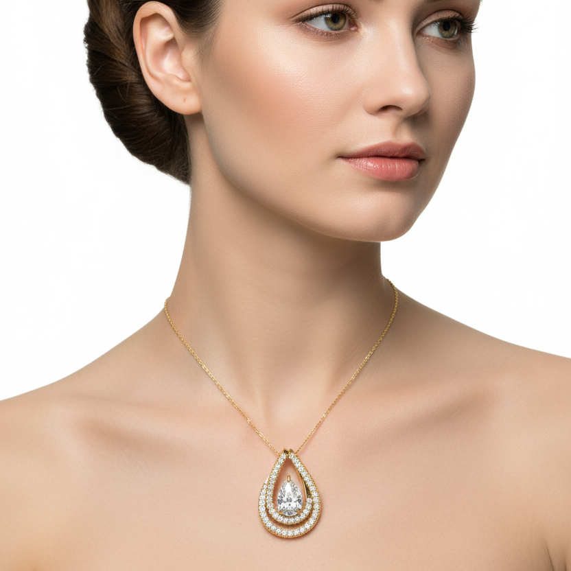 Female model wearing yellow gold pear-shaped diamond double halo pendant