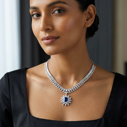 Female model wearing your blue gemstone necklace at a very petite scale