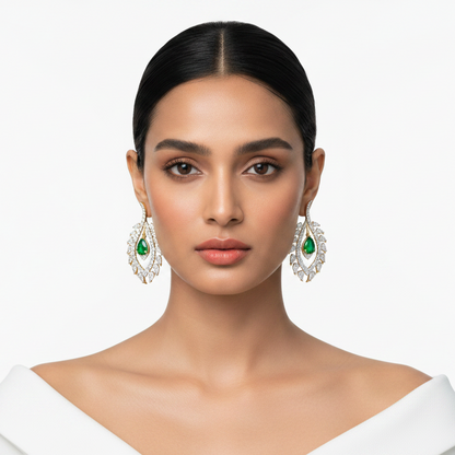Generated fresh variation - Indian female model wearing the yellow gold pear emerald and diamond botanical leaf chandelier earrings in very small size, straight front-facing angle bright clean white background with crisp contemporary styling