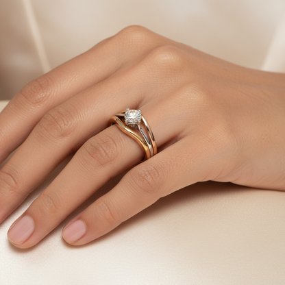 Generated image of a beautiful Indian female model wearing the tri-tone yellow gold white gold and rose gold round brilliant diamond four-claw solitaire engagement ring with large round brilliant diamond blazing with extraordinary icy fire in white gold four-claw setting on a spectacular wide tri-tone shank with three beautifully parallel stripes of yellow gold white gold and rose gold creating a beautiful bold architectural tri-colour gold design