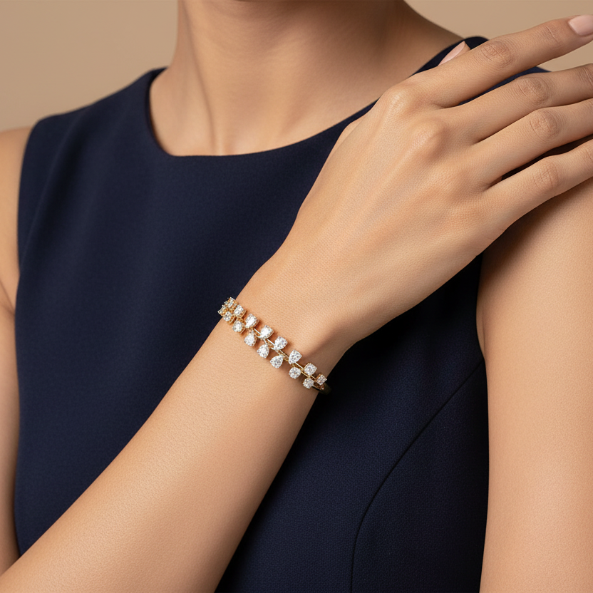Generated image of a beautiful Indian female model wearing the yellow gold diamond bangle bracelet with magnificent double-row scattered cluster of large pear-cut and round brilliant diamonds in a beautiful alternating zigzag botanical pattern across the face