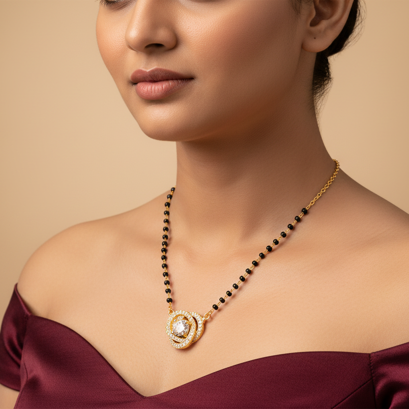 Generated image of a beautiful Indian female model wearing the yellow gold diamond mangalsutra with traditional black bead chain and spectacular swirling love-knot pendant featuring large round brilliant diamond centre surrounded by double swirl pavé diamond halo