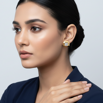 Generated image of a beautiful Indian female model wearing the yellow gold princess-cut diamond solitaire stud earrings with bold octagonal faceted yellow gold frame
