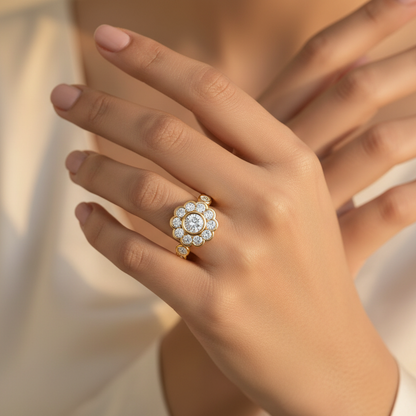 Generated image of a beautiful Indian female model wearing the yellow gold round brilliant diamond floral halo cocktail ring with round brilliant centre diamond in smooth yellow gold bezel surrounded by spectacular scalloped floral halo of large round brilliant diamonds within beautiful rounded scallop petal yellow gold frame and bezel-set round brilliant shoulder diamonds running along both sides of the shank all blazing simultaneously with extraordinary icy white fire and warm golden glow